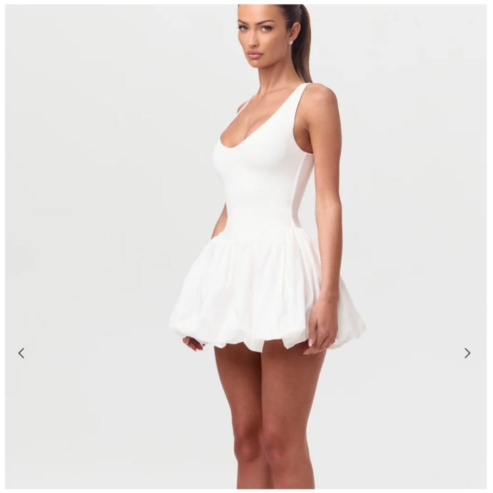 Sleeveless White Mini Dress with Flared Skirt